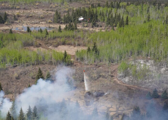 Helicopters deployed to battle Teepee Creek wildfire (Supplied, County of GP)