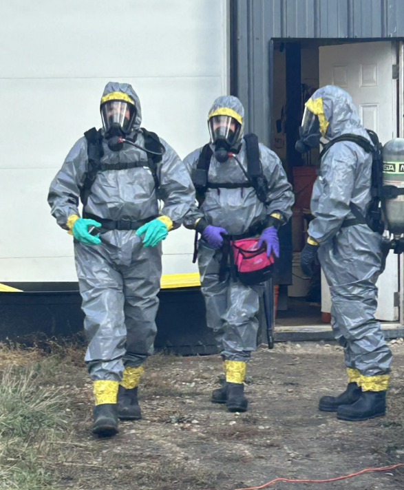 ALERT personnel dismantling the lab (Supplied, ALERT)